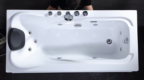 Modern white free standing acrylic bathtub with panel pillow and massage