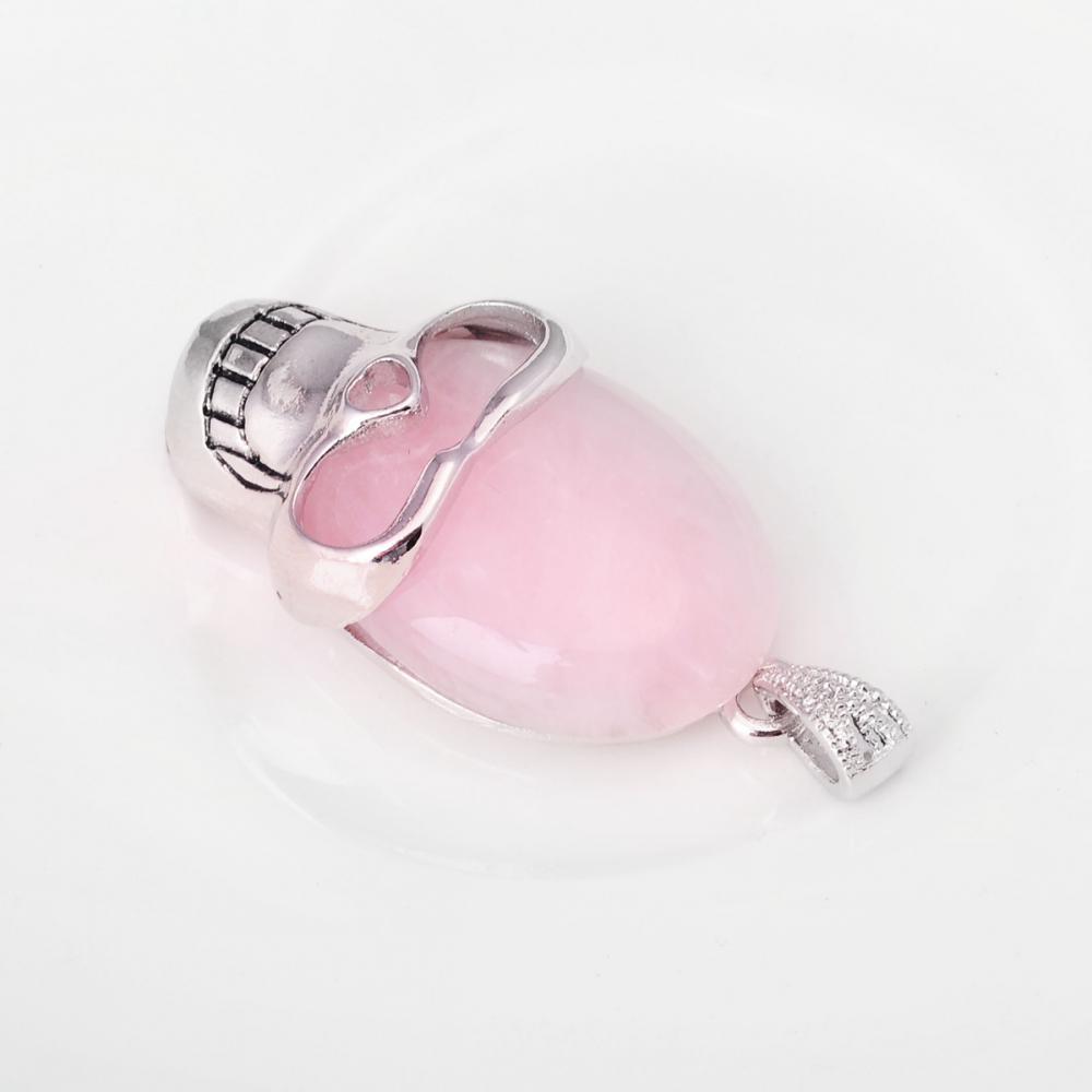 Pendentif crâne en alliage de quartz rose avec pierres semi-précieuses