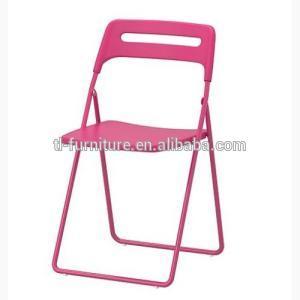 the pink plastic folding chair