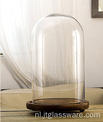Bescherm de glazen koepel van de decoratie met houten basis