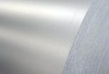 Fluorocarbon coated thin precision steel plate