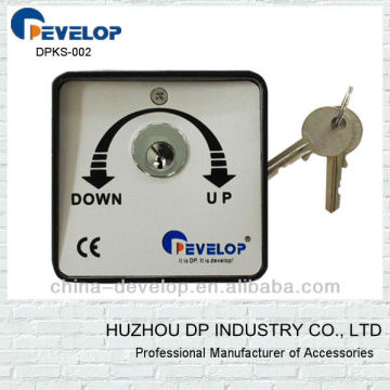 Electric rolling door key operated switch