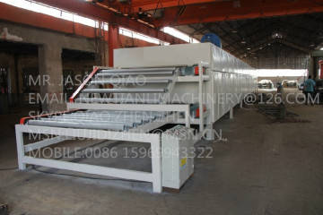 Dryer machine for rotary peeling veneer