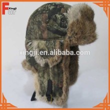 winter fur hat with fur pompoms