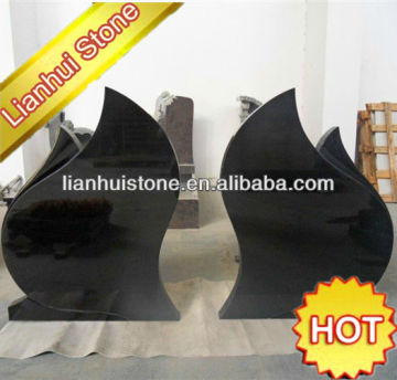 upright black double grave headstones