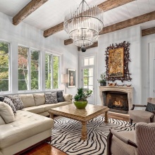 Custom travertine Tuscan inspired fireplace mantel