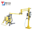 Air shaft robotic arm manipulator for roll handling