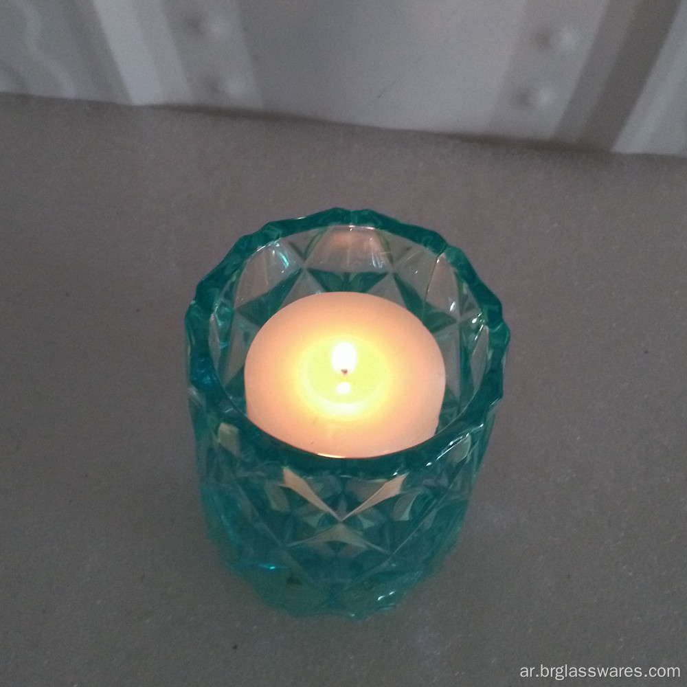 جرة شمعة زجاجية ملونة بتصميم فريد من نوعه