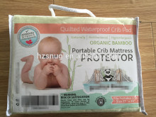 Portable crib mattress protector