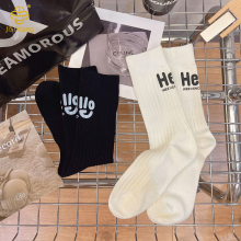 Version letter vertical stripe black and white mid tube sock