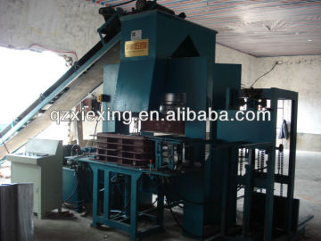 Automatic concrete hollow block machine