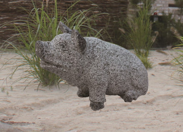 Garden pig stone statue