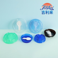 Plastic cup lid with spoon attached
