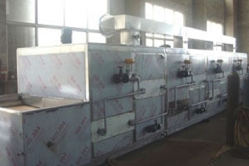 Mixing machine with jacketed horizontal ribbon