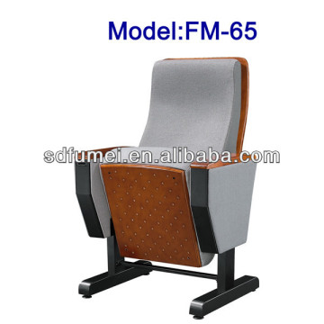 Movable auditorium seat