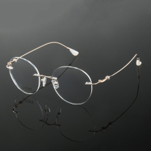 High-End Frameless Titanium Round Glasses for Women - Ready Stock