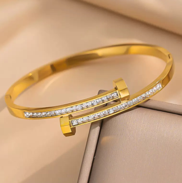 Gold-Plated Interlocking Stud Rhinestone Titanium Bangle