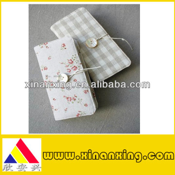 notebook with string and ribbon