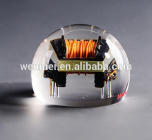 custom lucite paperweight with metal inside