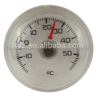 small round plastic refrigerator thermometer