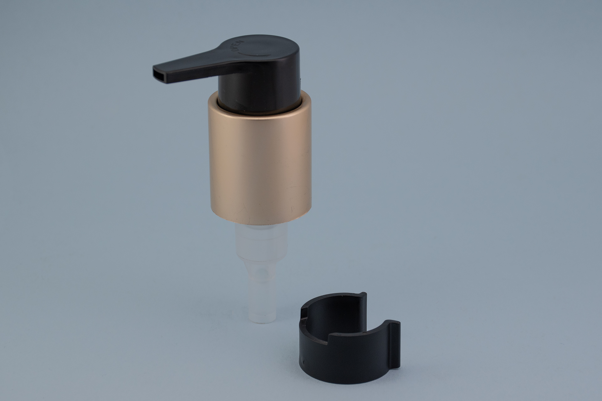 24/410 matte gold lotion pump with black extended reach actuator