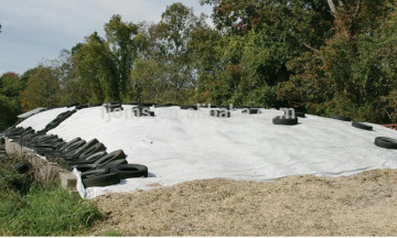 Reinforced plastic silage coveing for silage