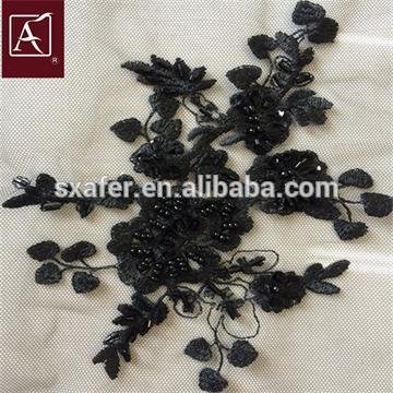 flower pattern bead embroidered fabric