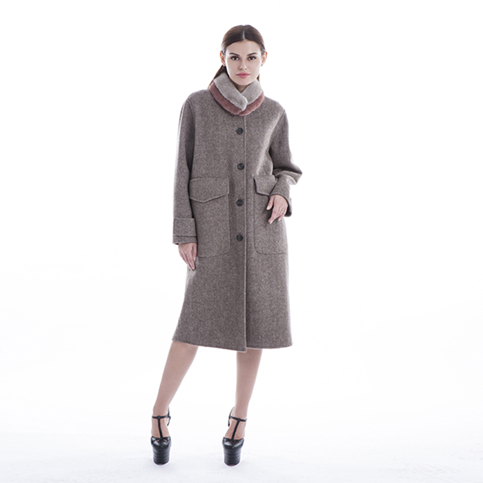 Sleeves of winter black and white checked cashmere overcoat