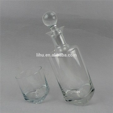 Slanted glass red wine bottle whisky decanter and whisky glass