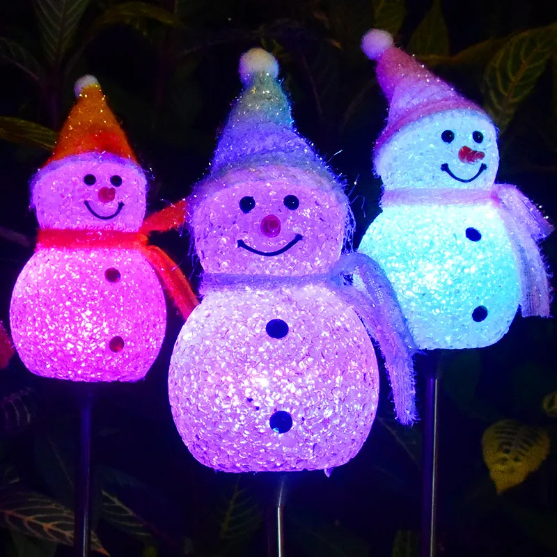 Illuminating Festive Snowman Solar Floor Lamps for Outdoor Decor
