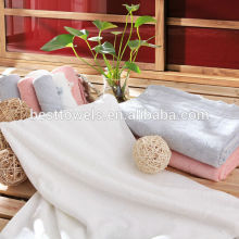 solid bath towel with jacquard