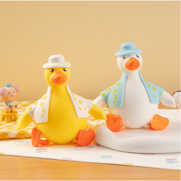 TPR soft duck toys in clothes