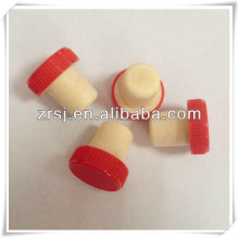 Red vodka bottle Plastic cap Synthetic cork
