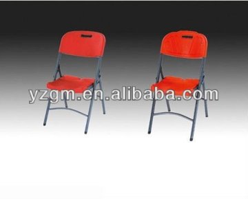 red plastic foldable chair