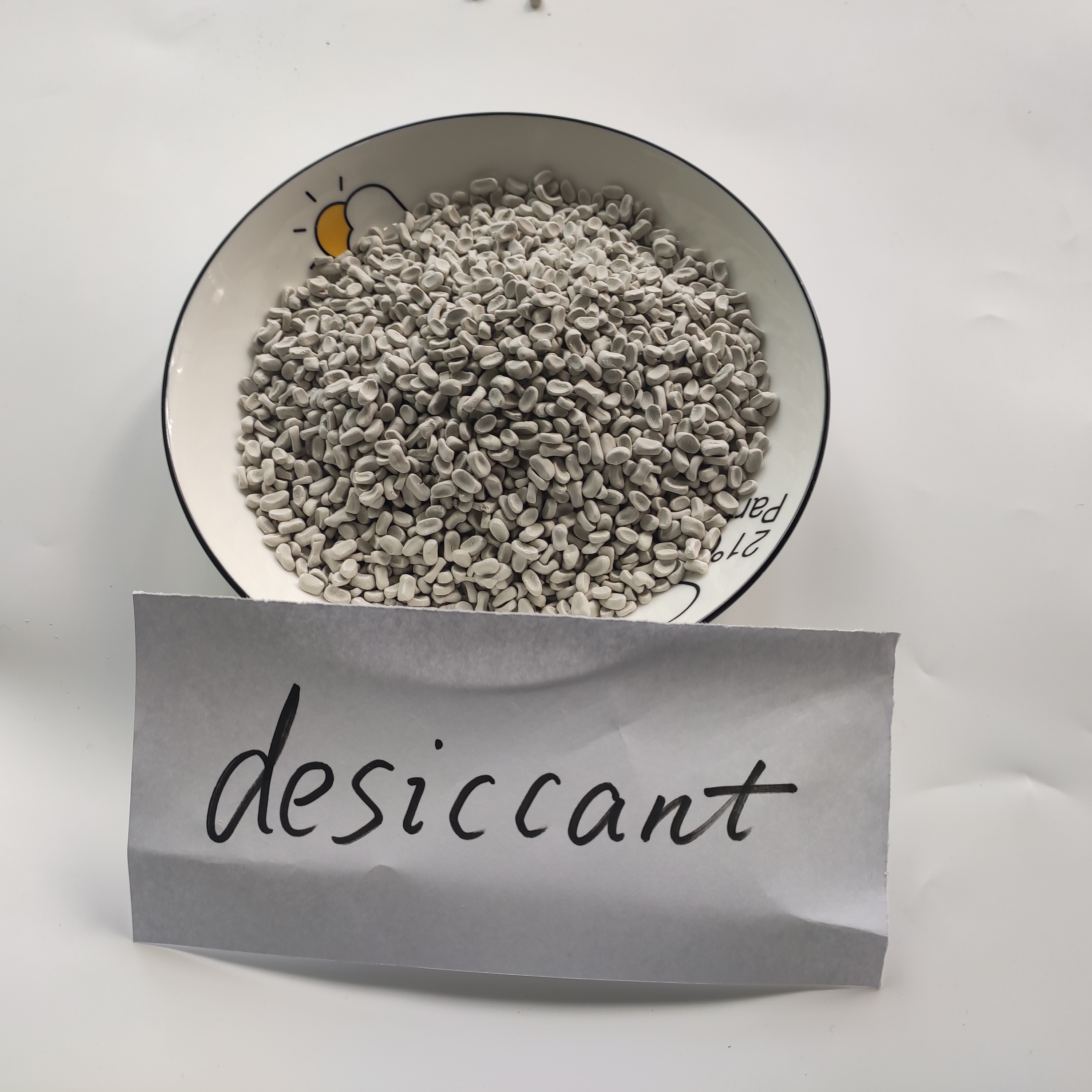 Granular desiccant masterbatch