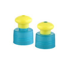 Yellow mushroom with blue push pull screw cap