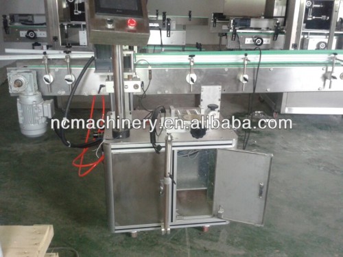 Automatic self-adhesive bottle labeling machine