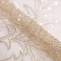 Dentelle de paillettes d&#39;abricot pour la mariée