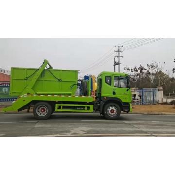 Camion à ordures de chargeur de swing.