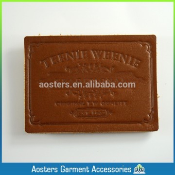 custom embossed leather labels for handbags