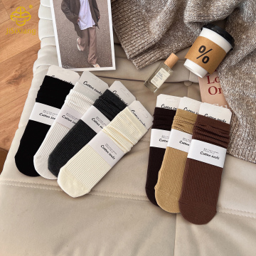 Solid color mid tube socks pile socks