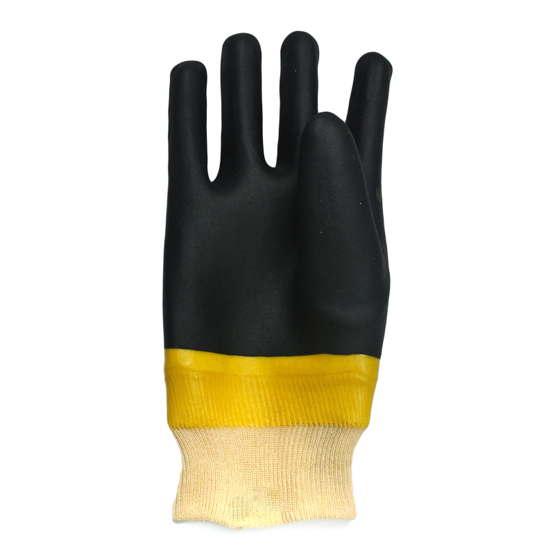 Gelbe und schwarze PVC-beschichtete Handschuh sandig