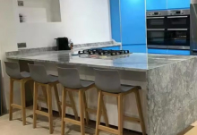 Kitchen quartz countertops with grey veins waterfalls