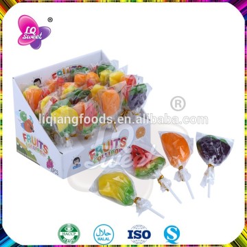 fruit shaped candy with lollipop