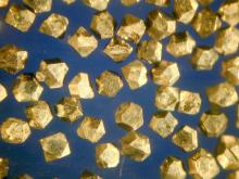 Superhard Material of Synthetic Diamonds Ti Coated