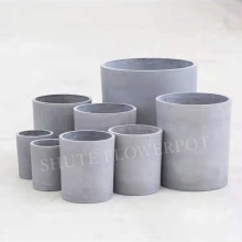 Petits pots de ciment en béton pour les plantes