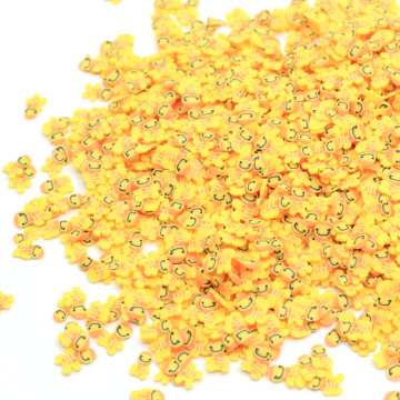 Arcilla polimérica en forma de hombre de pan de jengibre amarillo de gran venta para adornos hechos a mano decoración de vacaciones o arte de uñas