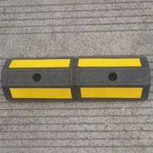 Black and Yellow Speed Chock Stopper with 2 Holes for Parking Curbs