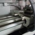 Tornio automatico CNC con caricatore di barre CK6140A