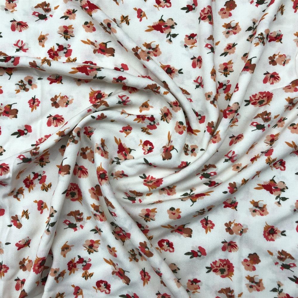 Viscose crepe on printed white base floral fabric